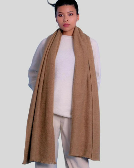Woman wearing tan cashmere handspun scarf and white pants - Luxurious Italian Cashmere Handspun Scarf