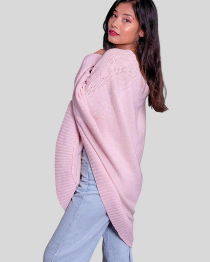 Stylish woman in pink sweater and jeans wearing Luxurious Italian Cashmere Poncho