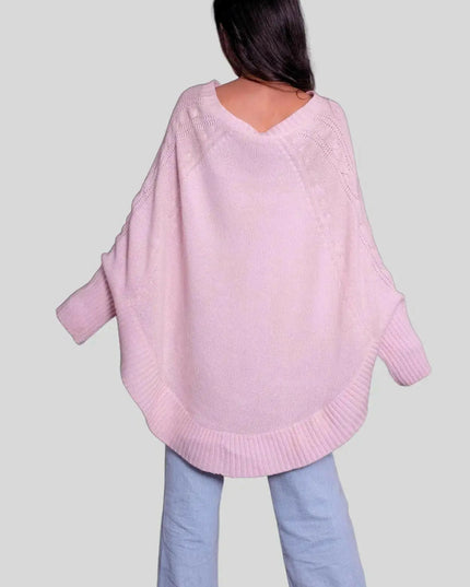 Luxurious Italian Cashmere Poncho - Woman in Pink Sweater and Jeans