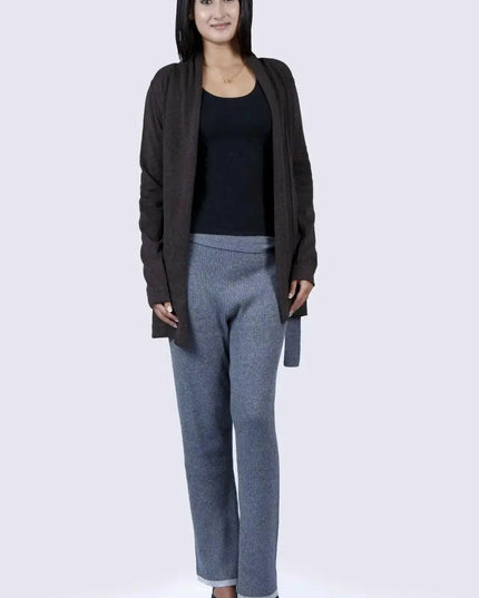 Woman in black top and grey pants wearing Luxurious Italian Cashmere Ribbed Bottom with Mid Rise Waistline