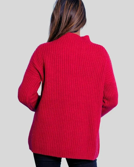 Woman in red sweater and jeans wearing Luxurious Italian Cashmere Ribbed Pullover
