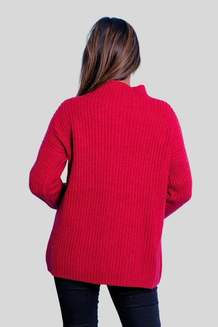 Woman in red sweater and jeans wearing Luxurious Italian Cashmere Ribbed Pullover