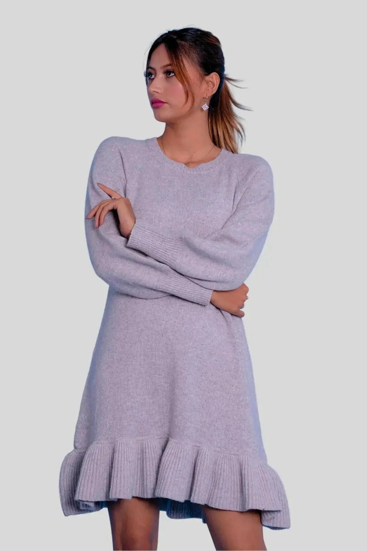 Woman wearing a grey cashmere ruffle dressLuxurious Italian Cashmere Ruffle Dress