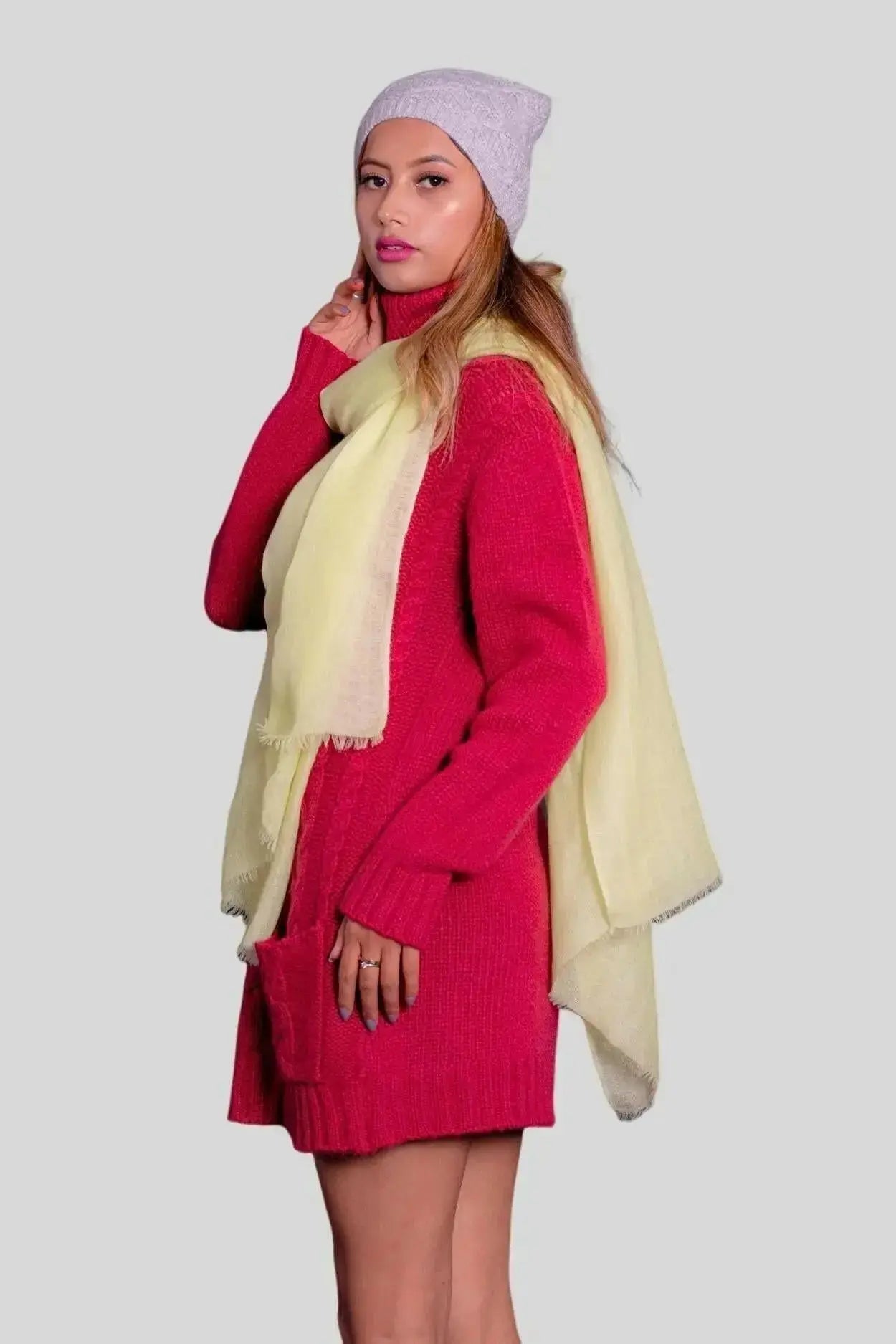 Luxurious Italian Cashmere Scarf featuring a woman in red sweater dress and white hat