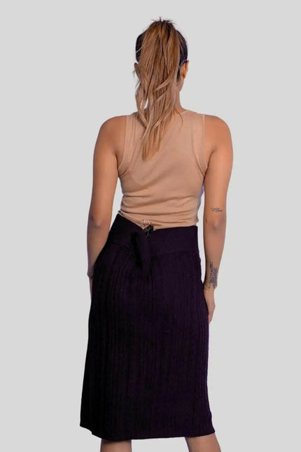 Luxurious Italian Cashmere Skirt featuring a woman in black skirt and tan top