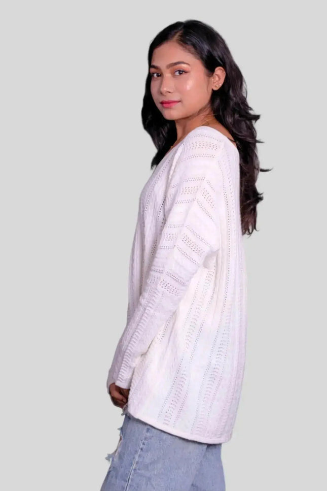 Luxurious Italian Cashmere Sweater on woman in white sweater and jeans