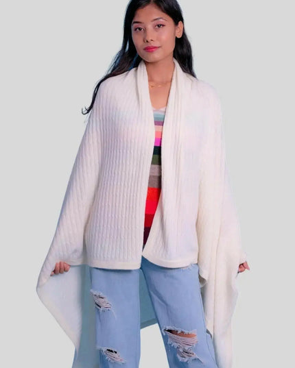 Luxurious Italian Cashmere Sweater - White sweater and ripped jeans on a woman