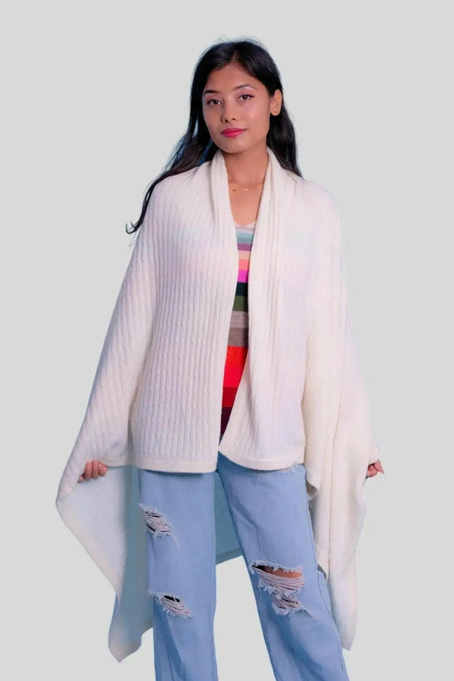 Luxurious Italian Cashmere Sweater - White sweater and ripped jeans on a woman