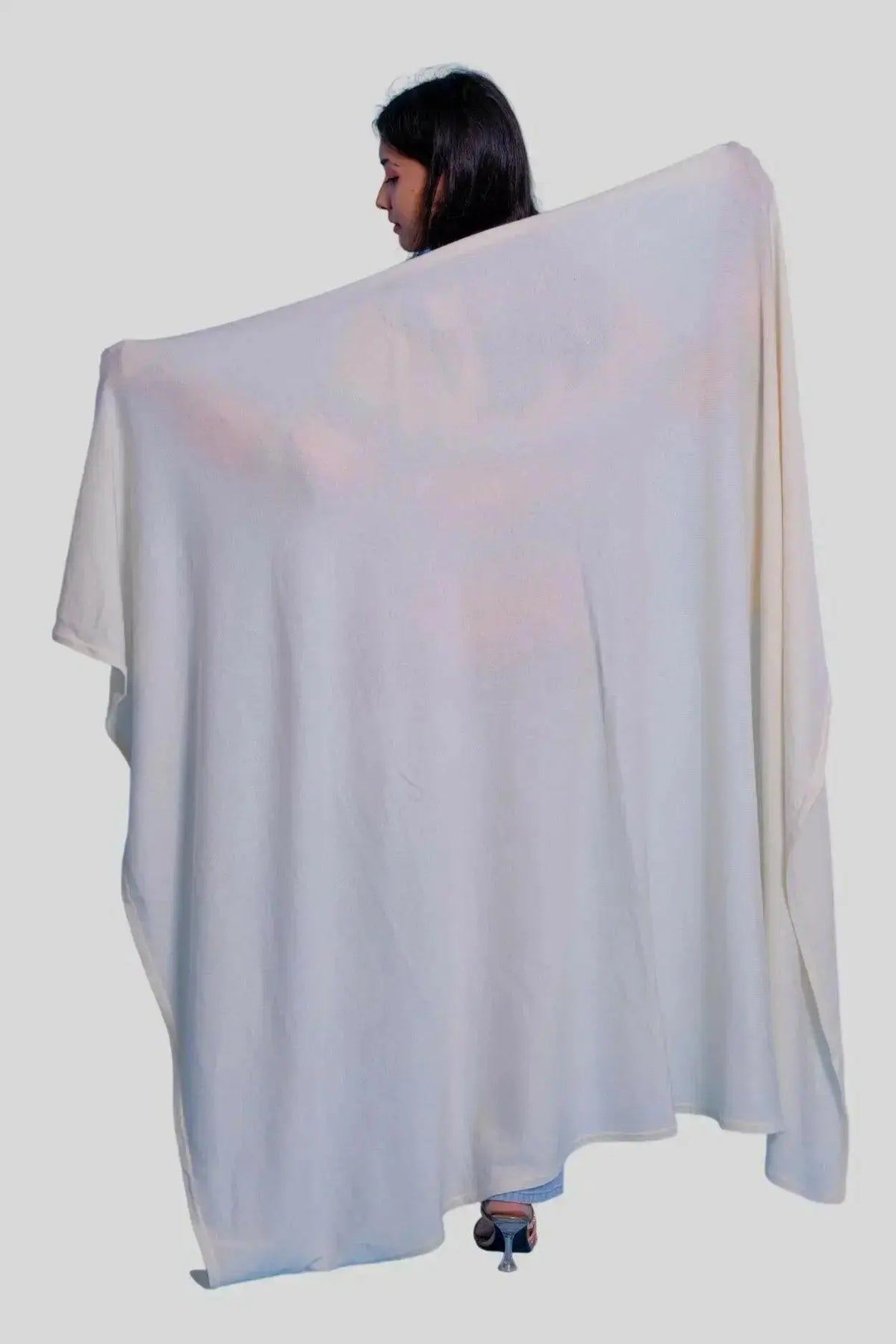 Luxurious Italian Cashmere Throw - woman standing in front of white background