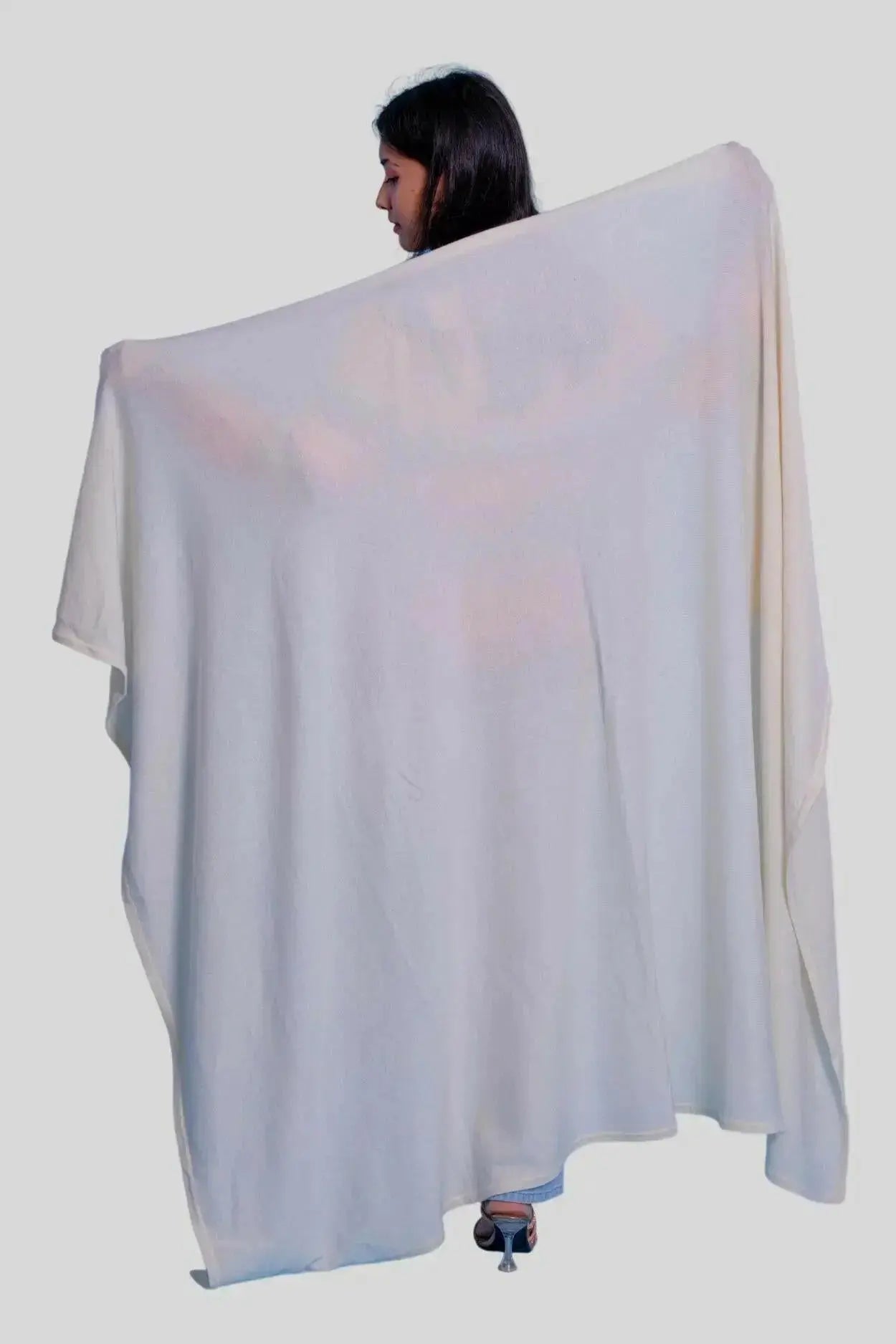 Luxurious Italian Cashmere Throw - woman standing in front of white background