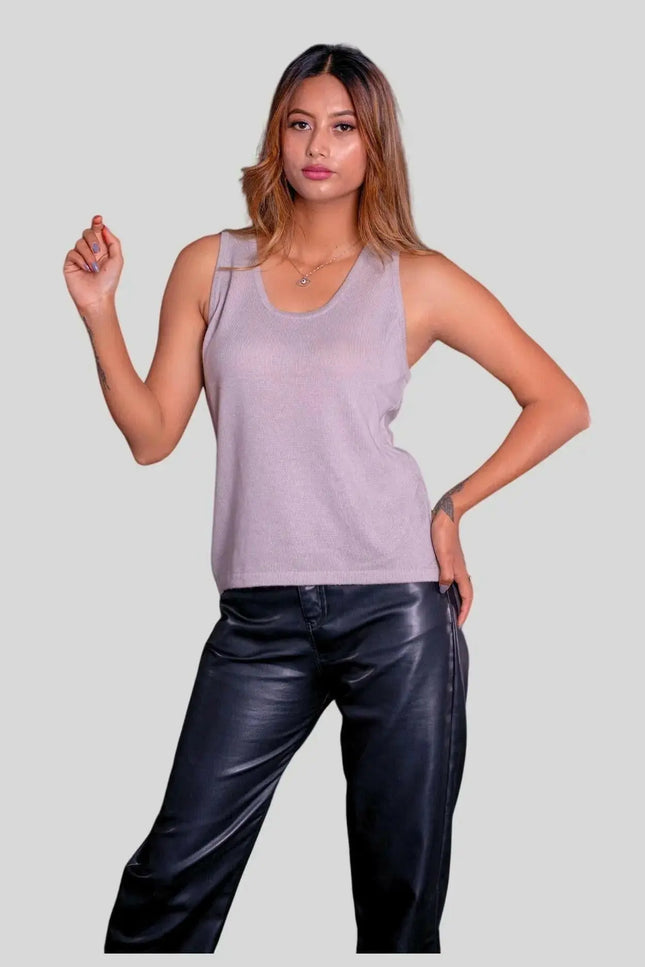 Woman in purple tank top and leather pants, flattering fit of Luxurious Italian Cashmere Top