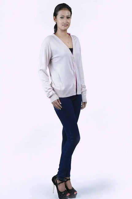 Luxurious Italian Cashmere V-Neck Sweater on Woman in White Sweater and Jeans