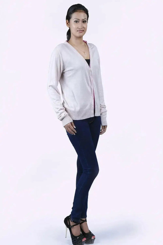 Luxurious Italian Cashmere V-Neck Sweater on Woman in White Sweater and Jeans