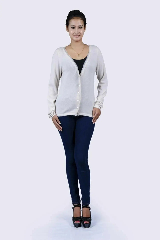 Woman in luxurious Italian cashmere V-neck sweater and jeans