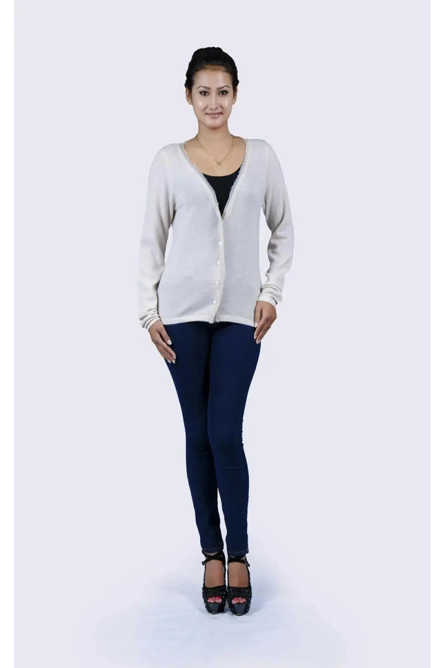 Woman in luxurious Italian cashmere V-neck sweater and jeans