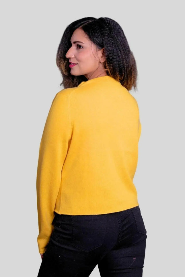 Luxurious Women’s Cashmere Cardigan featuring a woman in a yellow sweater