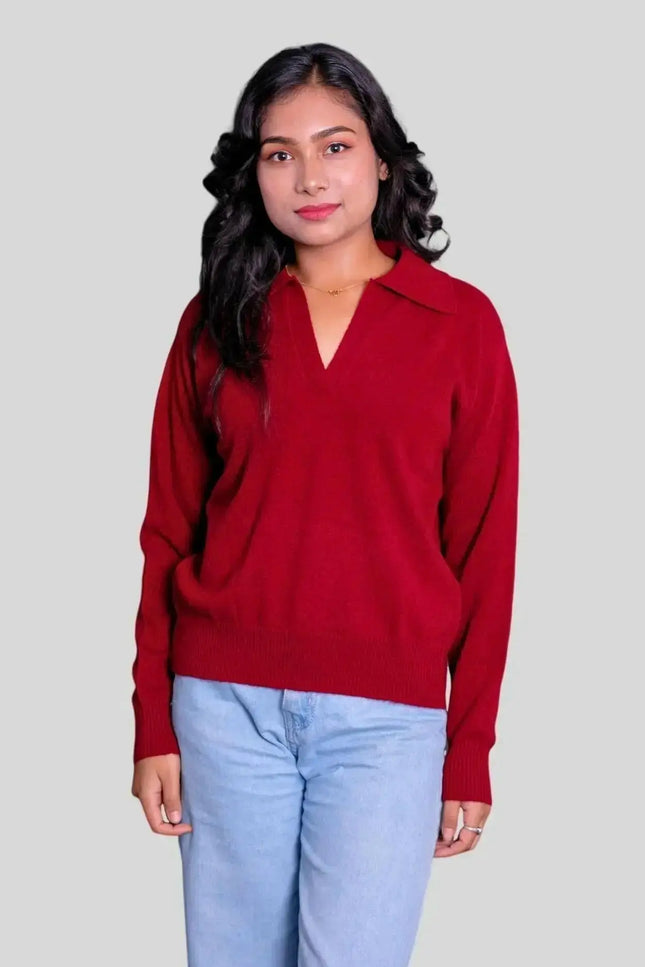 Stylish woman in red sweater and jeans, showcasing Luxurious Women’s Cashmere Polo