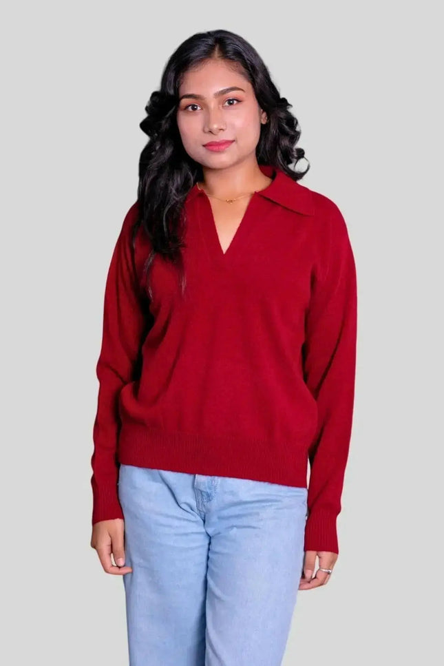 Stylish woman in red sweater and jeans, showcasing Luxurious Women’s Cashmere Polo