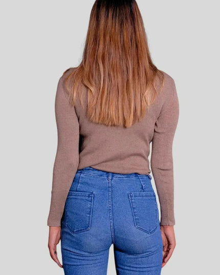 Luxurious Women’s Cashmere Turtle Neck Pullover - Woman in jeans and sweater