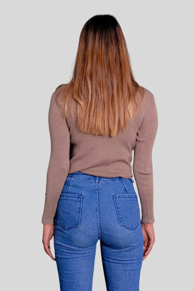 Luxurious Women’s Cashmere Turtle Neck Pullover - Woman in jeans and sweater