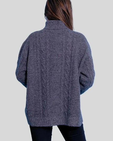 Luxuriously Soft Cashmere Turtle Neck Sweater on woman in grey sweater and black jeans