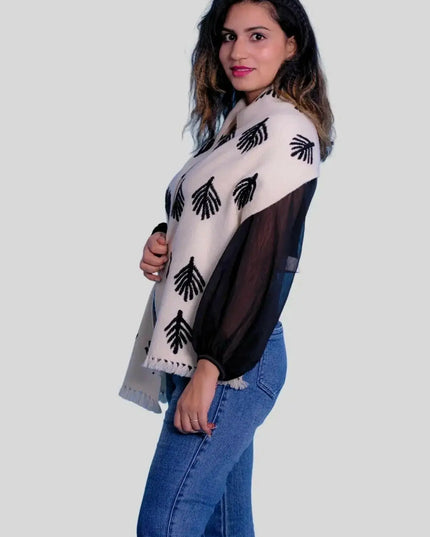 Woman wearing a luxury Italian cashmere scarf with hand embroidery