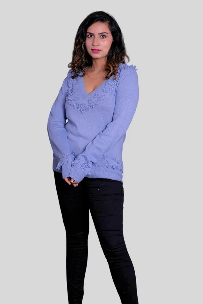 Luxury Cashmere V-Neck Pullover | Woman in Blue Sweater and Black Jeans