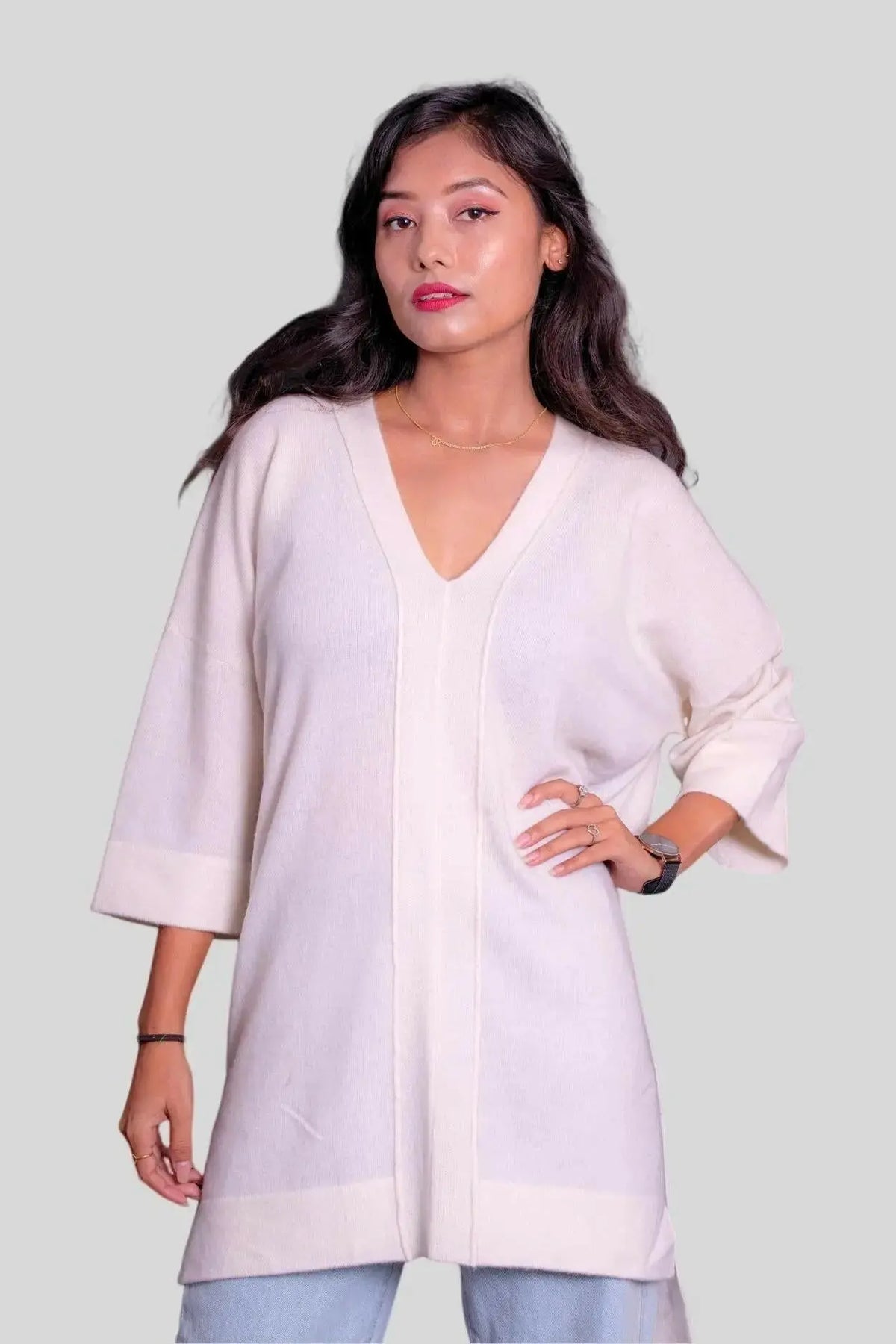 Luxury Italian Cashmere Dress - Woman in white sweater and jeans