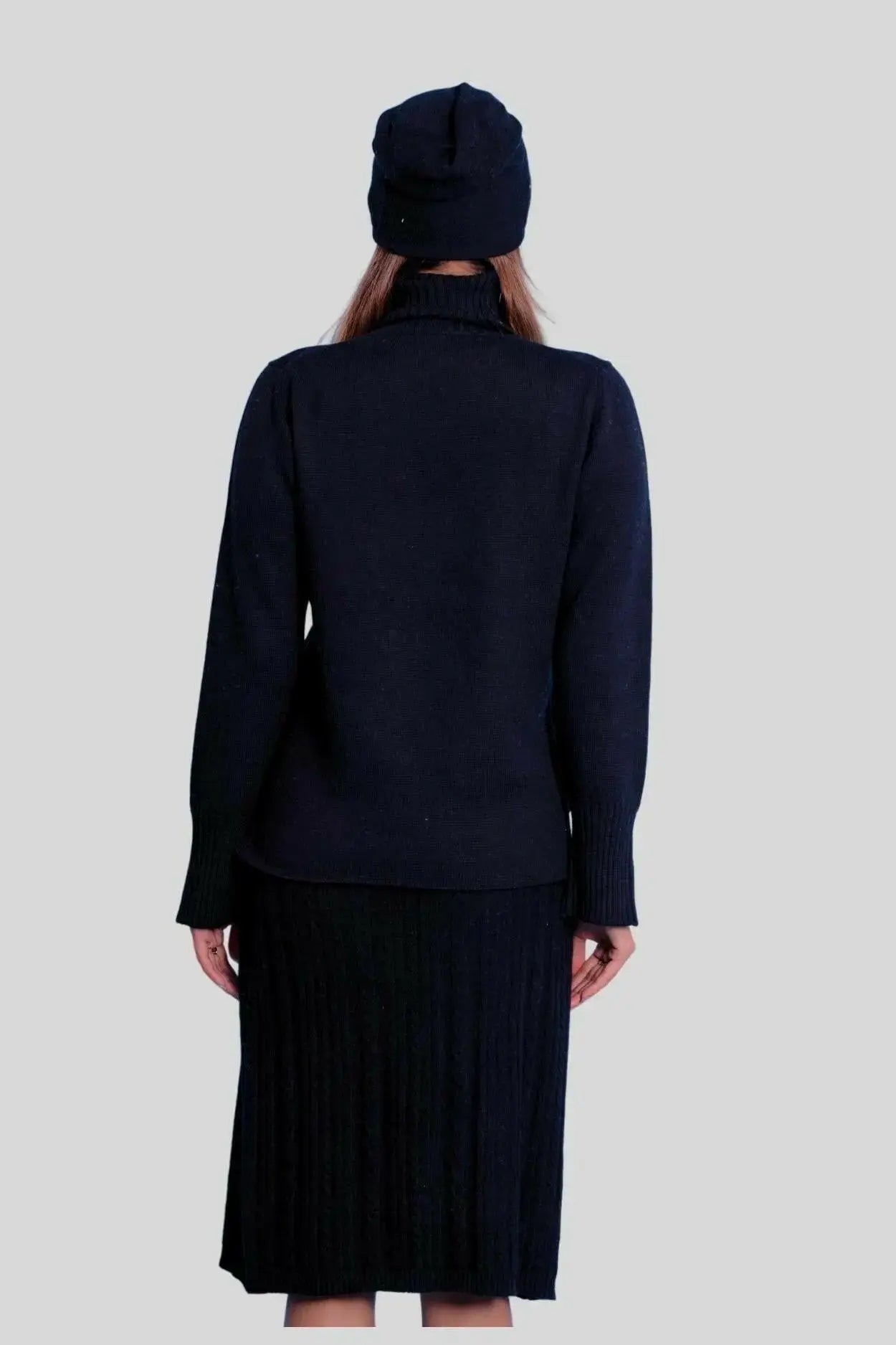Woman in black cashmere dress by Luxury Italian brand