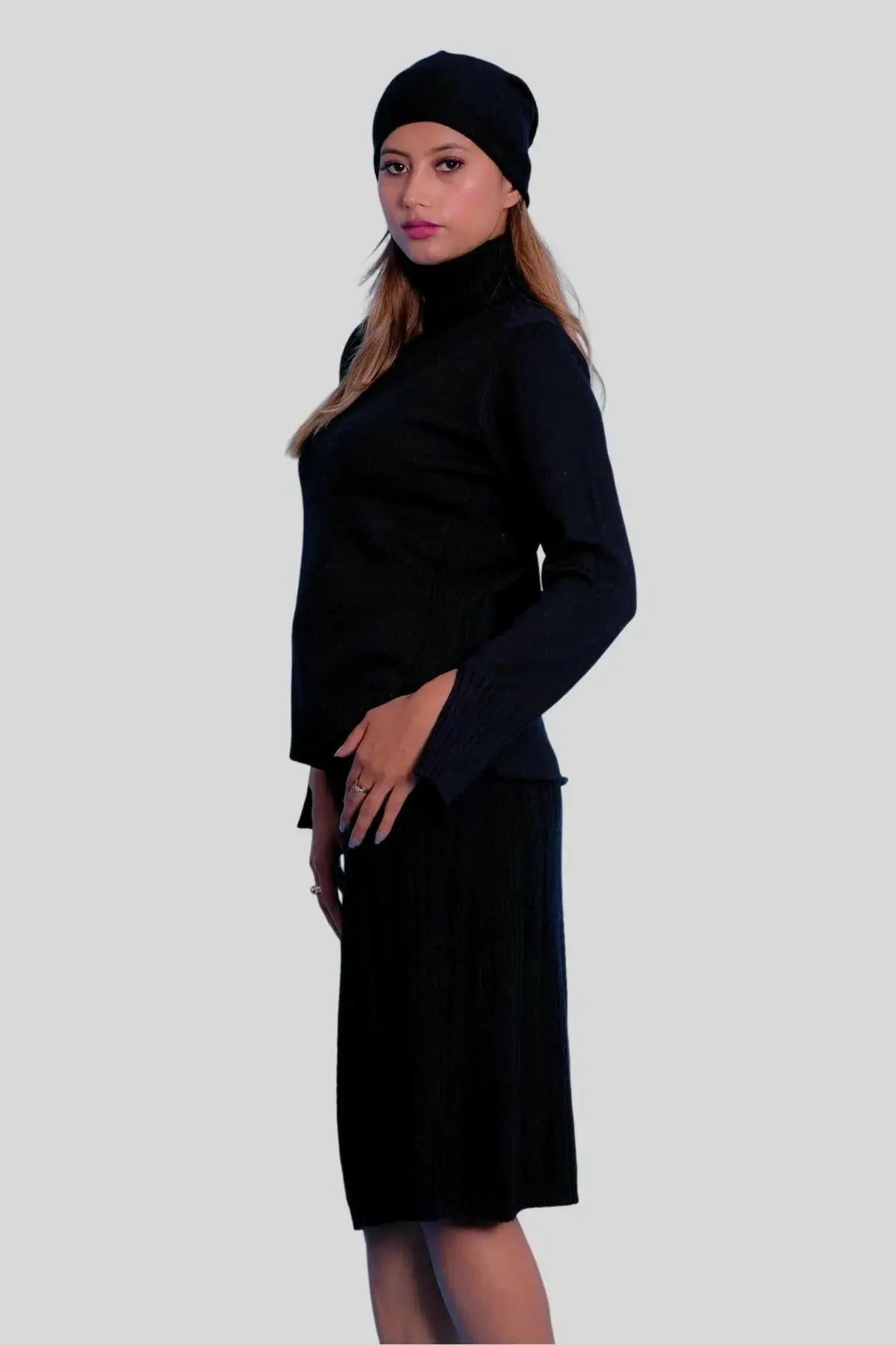 Luxury Italian Cashmere Dress featuring a woman in a black dress and hat