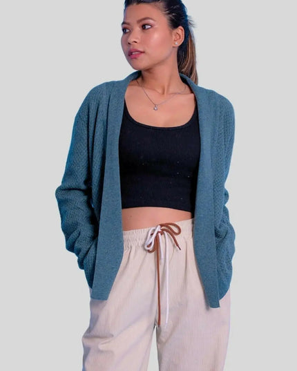Luxury Italian Cashmere Honeycomb Open Cardigan - Woman wearing blue cardigan and beige pants