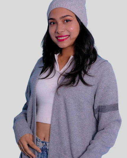 Luxury Italian cashmere hat with woman in grey cardigan and jeans