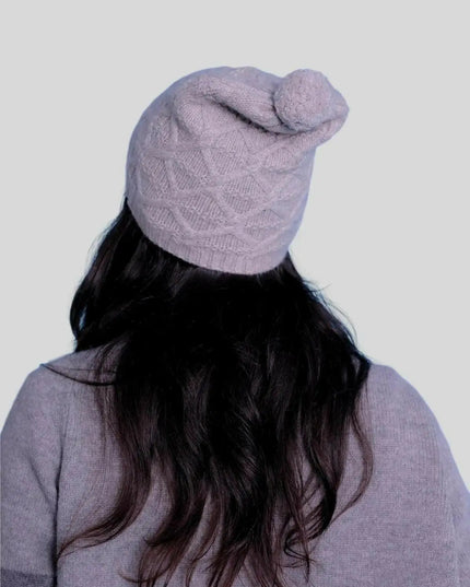 Luxury Italian Cashmere Pompom Hat - Woman with long hair wearing a grey hat