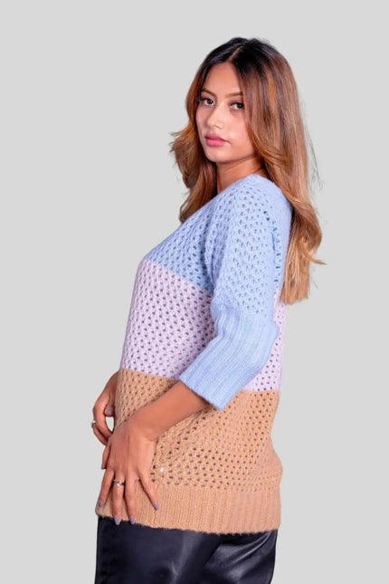 Luxury Italian Cashmere Pullover: Woman wearing blue and pink sweater