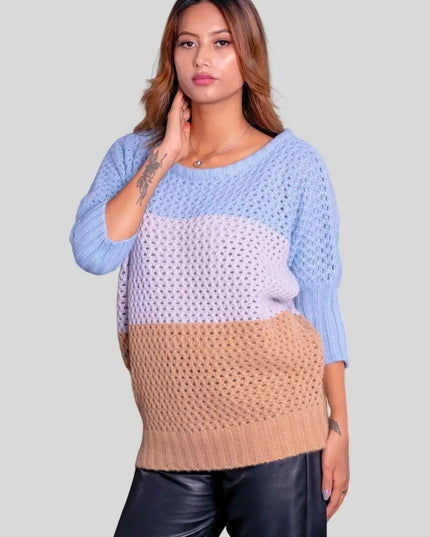 Luxury Italian Cashmere Pullover worn by woman in blue and beige sweater