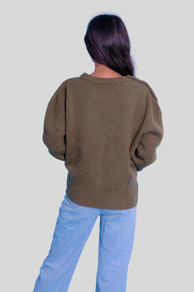 Luxury Italian Cashmere Sweater - woman in brown sweater and blue jeans