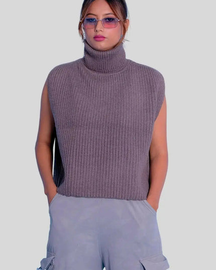 Woman in grey sweater and cargo shorts wearing Luxury Italian Cashmere Turtle Neck ribbed