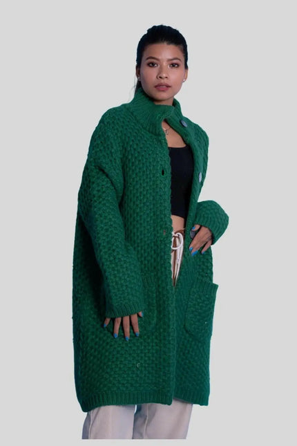 Woman wearing moss stitch heavy cardigan in green cable knit coat | KCI 263