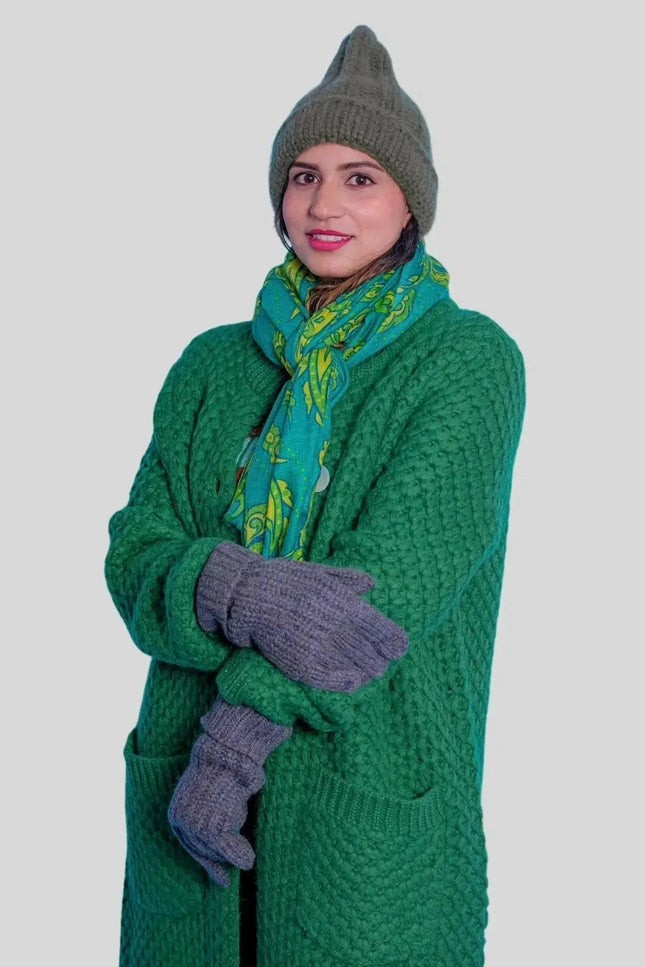 Woman in green moss stitch heavy cardigan and hat | KCI 263