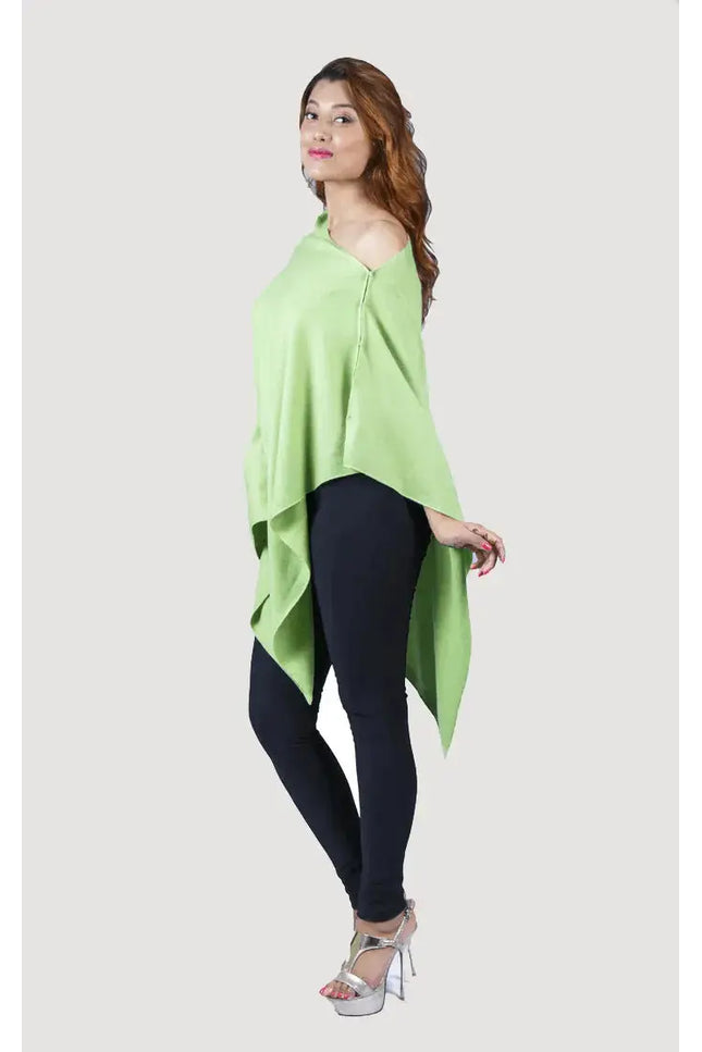 Woman wearing green cashmere poncho - Women’s cashmere poncho | KCI 246